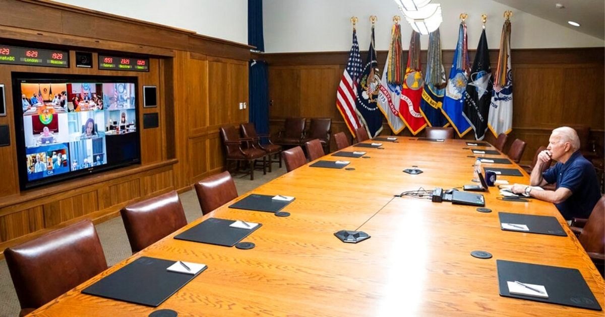 President Joe Biden is seen meeting virtually with his national security team and senior officials for a briefing on Afghanistan, on Sunday, Aug. 15, 2021, at Camp David, Maryland. Documents leaked recently appear to imply the Biden administration was just beginning to discuss evacuation of key US and Afghan personnel as Kabul was about to fall.