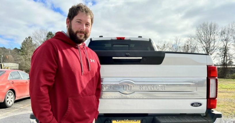 Nathan Kirk of Oneonta, Alabama, displays his personalized plate.