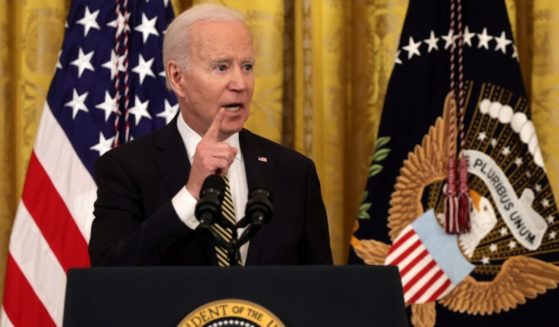 President Joe Biden attempts to explain new legislation regarding internet 'revenge porn; Wednesday in Washington.