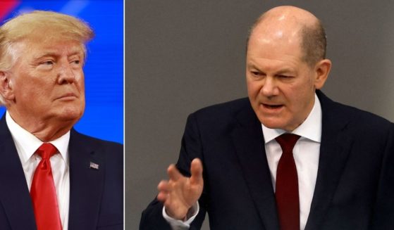 At left, former President Donald Trump speaks during the Conservative Political Action Conference at the Rosen Shingle Creek in Orlando on Saturday. At right, German Chancellor Olaf Scholz announces a new commitment to defense during an extraordinary session of the Bundestag in Berlin on Sunday.