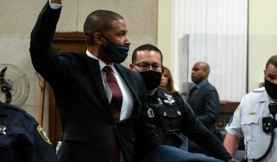 Jussie Smollett is led out of the courtroom after being sentenced at the Leighton Criminal Court Building on March 10 in Chicago.