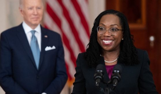 President Joe Biden, left, looks on as Judge Ketanji Brown Jackson speaks in the White House in Washington, D.C., on Feb. 25.