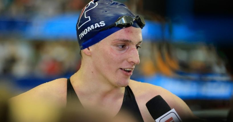 Lia Thomas of the University of Pennsylvania talks to a reporter after winning the 500-yard freestyle at the NCAA Division I Women's Swimming & Diving Championship on March 17 in Atlanta.