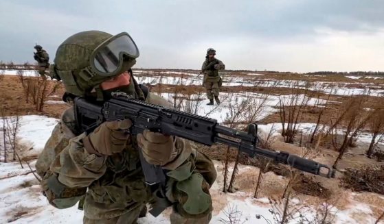 Russian troops take their positions during military drills at the Obuz-Lesnovsky training ground in Belarus on Feb. 19.