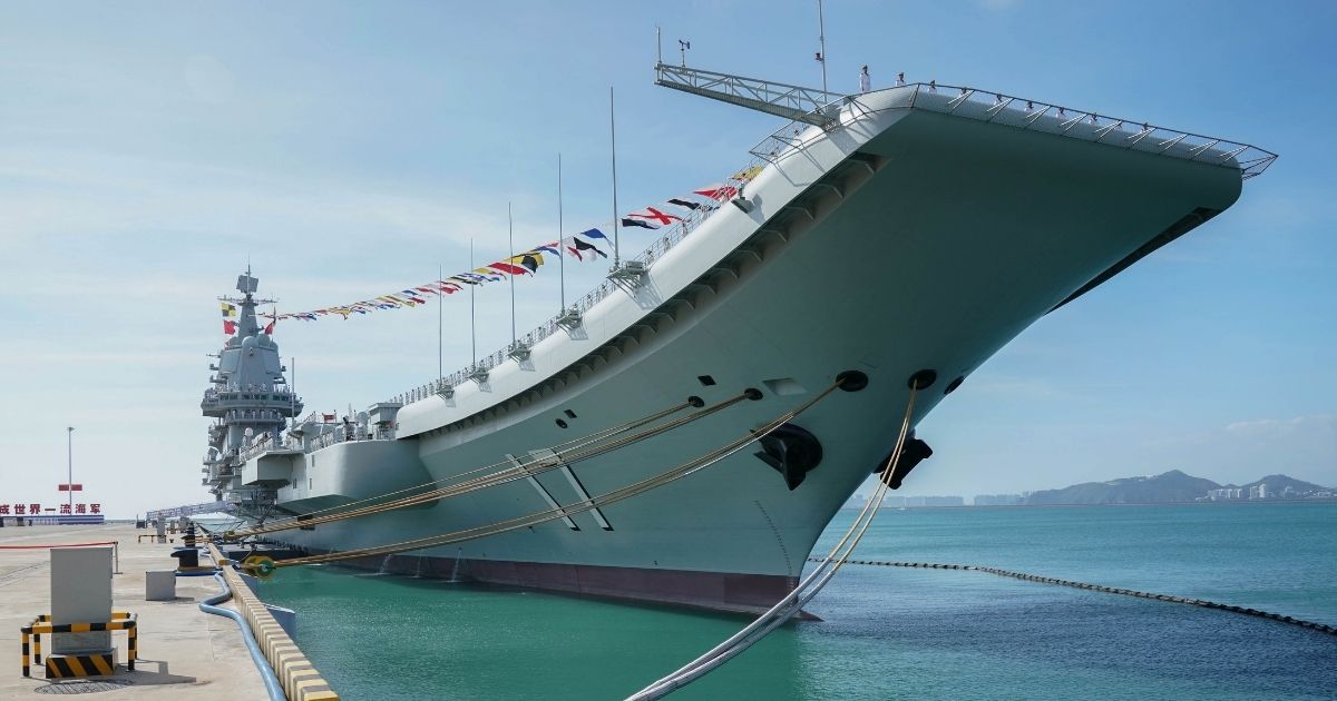 The Shandong, China's first domestically built aircraft carrier, is seen at the Sanya naval port in Hainan Province on Dec. 17, 2019.