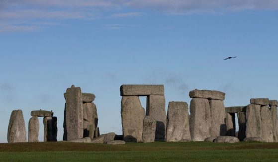 Visitors took a photograph of Stonehenge, a prehistoric monument in Wiltshire, England, and one of the oldest structures in the world.