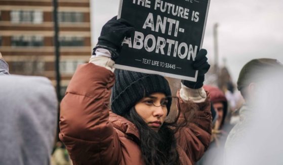 Pro-life demonstrators listen to organizers and activists during a Right to Life rally in Dallas on Jan. 15, 2022.