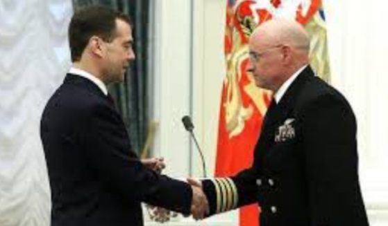 In 2011, then-President Dmitry Medvedev, left, of Russia bestowed a Russian medal "For Merit in Space Exploration" to American astronaut Scott Kelly, right.