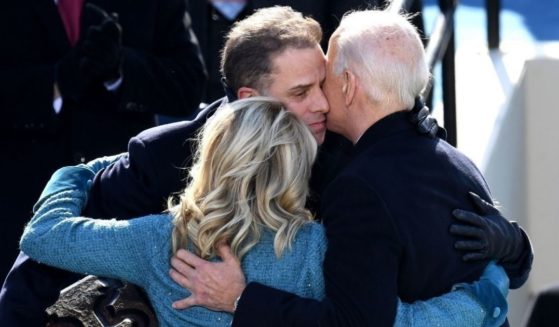 Joe Biden hugs first lady Jill Biden and his son Hunter Biden after being sworn in as president on Jan. 20, 2021, in Washington.