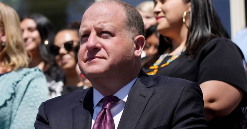 Colorado Gov. Jared Polis signed a pro-abortion law outside the governor's mansion in Denver on April 4.