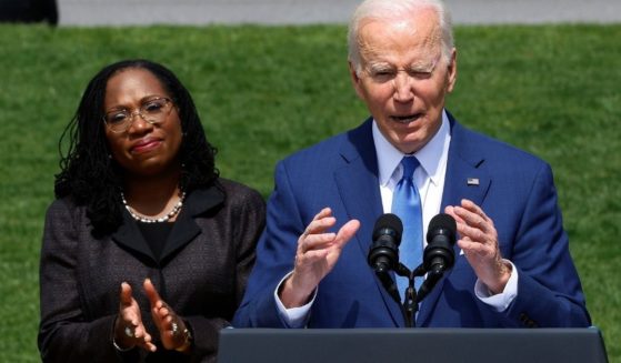 Ketanji Brown Jackson looks on while President Joe Biden delivers remarks on the South Lawn of the White House on Friday in Washington, D.C.