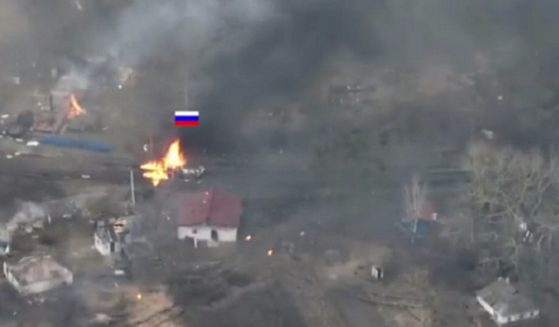 Footage released by the Ukrainian government shows a Ukraine tank attacking a Russian armored column.