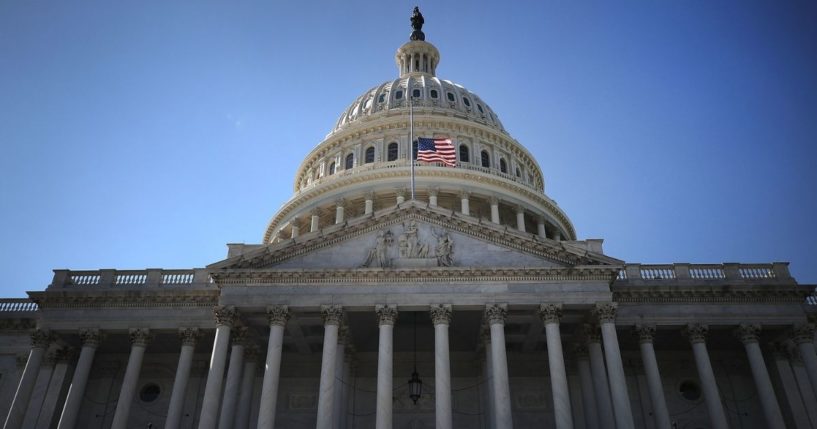 An American flag flies at half-staff at the U.S. Capitol on Oct. 2, 2017, in Washington, D.C.