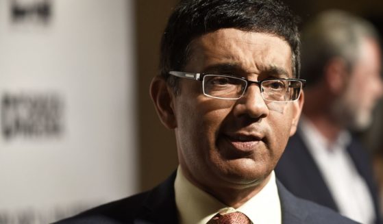 Dinesh D'Souza attends the D.C. premiere of his film "Death of a Nation," at E Street Cinema in Washington on Aug. 1, 2018.