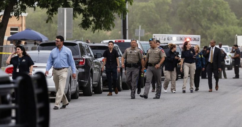 Law enforcement on the scene of Tuesday's mass shooting at Robb Elementary School in Uvalde, Texas.