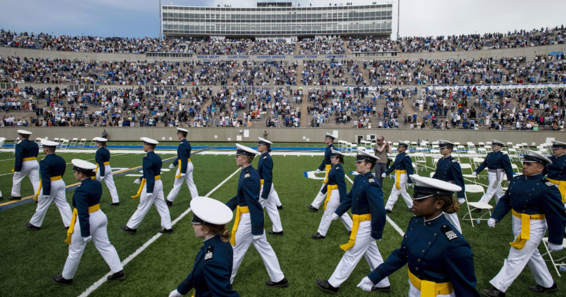 Four senior cadets at the US Air Force Academy are facing severe penalties for refusing the COVID vaccine.