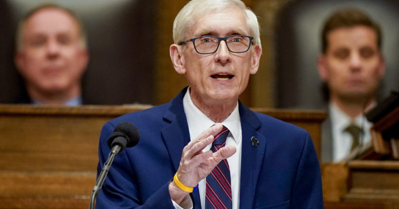 Wisconsin Gov. Tony Evers addresses a joint session of the Legislature in the Assembly chambers in Madison, Wis., in February.. Wisconsin's Supreme Court ruled Wednesday that political appointees don't have to leave their posts until the Senate confirms their successor.