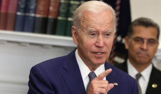 President Joe Biden delivers remarks about his executive order concerning abortion Friday as Health and Human Services Secretary Xavier Becerra listens.