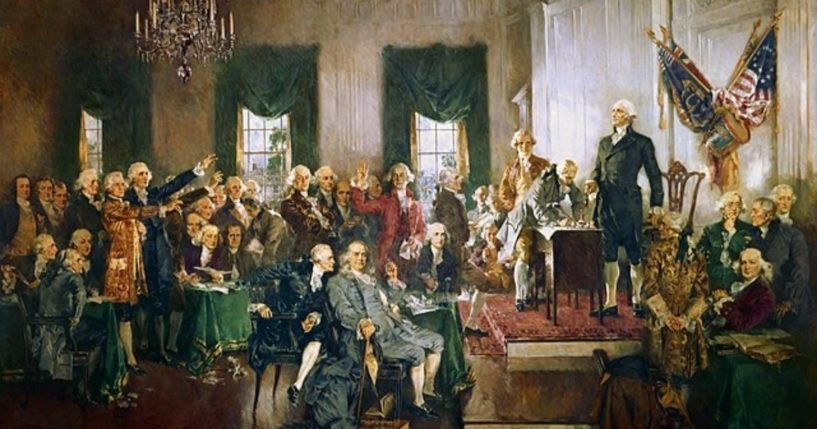 The Founding Fathers sign the Constitution.