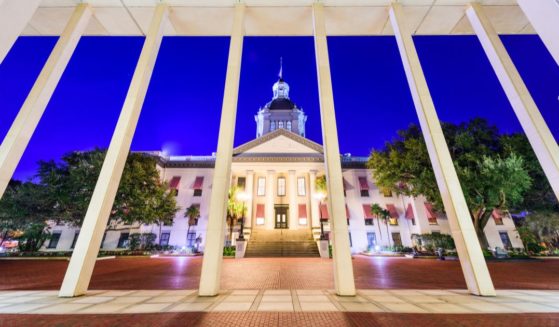 The Florida Capitol building shines at night in Tallahassee, Florida.