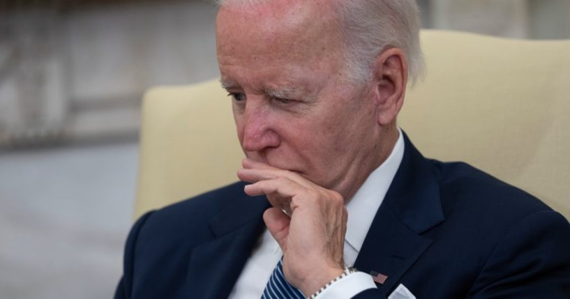 President Joe Biden speaks to journalists in the Oval Office at the White House on Tuesday in Washington, D.C.