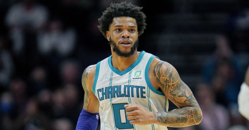 Charlotte Hornets forward Miles Bridges moves up court during a game against the Denver Nuggets at Spectrum Center on March 28.