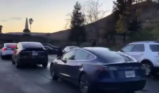 A Tesla charging line can be seen in California.