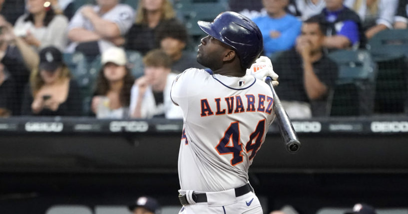 The Houston Astros' Yordan Alvarez watches his sacrifice fly off Chicago White Sox starting pitcher Johnny Cueto during the first inning of a game on Monday in Chicago.