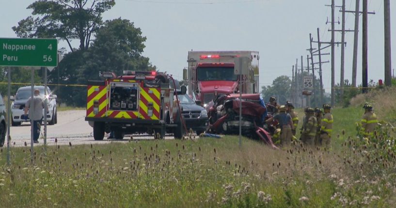 First responders work the scene of a car crash that killed U.S. Rep. Jackie Walorski and two others.