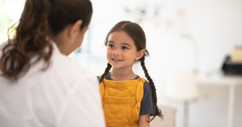 A young girls seeing a female doctor.