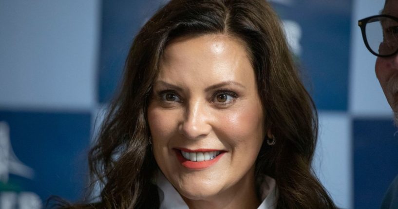 Michigan Governor Gretchen Whitmer poses for photos with volunteers after speaking at a canvass kickoffs event on Michigan Primary Election Day on Aug. 2 in Grand Rapids, Michigan.