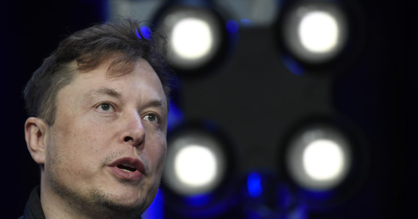 Tesla CEO Elon Musk speaks at a conference in Washington, D.C., on March 9. Musk and representatives of social media giant Twitter are due in court in October for a trial that will decide whether the world's richest man will be forced to complete his agreed-to $44 billion acquisition of Twitter.