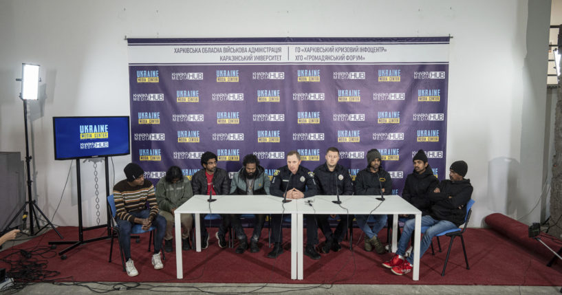 Sri-lankan former captives Nilojan Vasanthakumar, Uthayakamar Mary Edid Prema, Sharujan Gianeswaran, Thinees Jokenthhiran, Dilukshan Robertclive, Dilujan Paththinajakan, Ainkaranathan Ganesamoorthi and Head of investigation police department attend a news conference in Kharkiv, Ukraine, on Saturday.