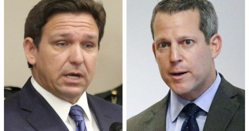 In a court filing, Florida Gov. Ron DeSantis said Andrew Warren, right, "had no First Amendment right, as a public official, to declare that he would not perform his duties under Florida law."