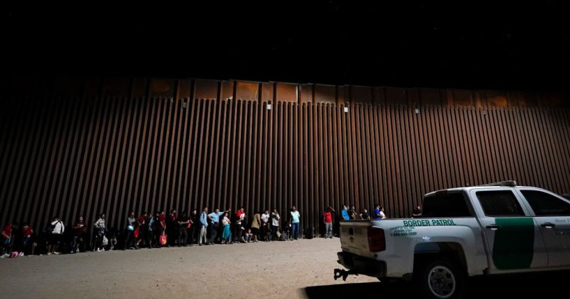 Illegal immigrants waiting to be processed