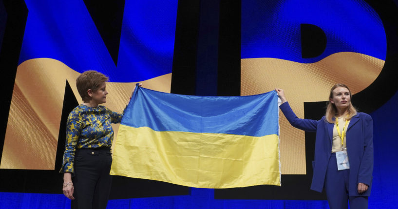 First Minister Nicola Sturgeon, left, on stage alongside Lesia Vasylenko, right, Ukrainian Member of Parliament after speaking during the SNP conference at the Event Complex Aberdeen in Aberdeen, Scotland, on Saturday.