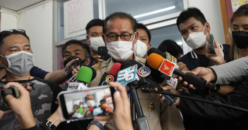 Chief executive of Uthai Sawan Sub-district Administrative Organization Danaichok Boonsom talks to reporters at a police station in Uthai Sawan, north eastern Thailand, on Sunday.