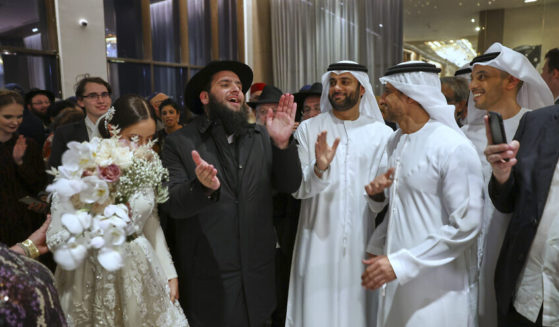 UAE Rabbi Levi Duchman (L2) and Lea Hadad (L1) during their wedding. With 1,500 guests from around the world, including leading rabbis, dignitaries and Emirati royals, the wedding is the largest Jewish event in the history of the Emirates. Rabbi Duchman, with support from the government, has built much of the country’s Jewish infrastructure that has seen the burgeoning Jewish community flourish.