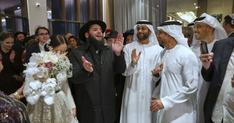 UAE Rabbi Levi Duchman (L2) and Lea Hadad (L1) during their wedding. With 1,500 guests from around the world, including leading rabbis, dignitaries and Emirati royals, the wedding is the largest Jewish event in the history of the Emirates. Rabbi Duchman, with support from the government, has built much of the country’s Jewish infrastructure that has seen the burgeoning Jewish community flourish.