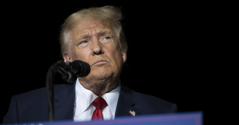 Former President Donald Trump pauses while speaking at the Minden-Tahoe Airport in Minden, Nevada, on Oct. 8.