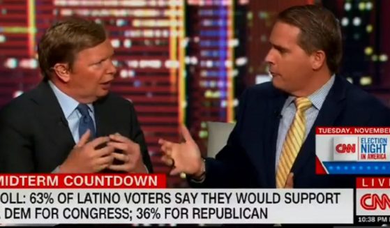 Former President Barack Obama adviser Jim Messina, left, and Scott Jennings, who served as a special assistant to the president during former President George W. Bush's administration, appear on "CNN Tonight" on Wednesday.