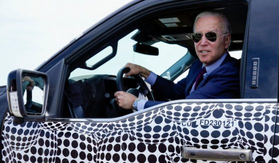 President Joe Biden drives a Ford F-150 Lightning