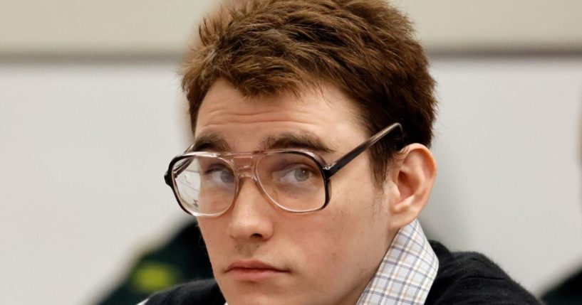 Marjory Stoneman Douglas High School shooter Nikolas Cruz looks up as his public defender gives her opening statement during the penalty phase of his trial at the Broward County Courthouse in Fort Lauderdale, Florida, on Aug. 22.