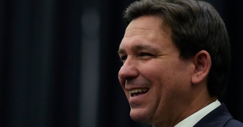 Florida Gov. Ron DeSantis smiles during a news conference on Sept. 22.