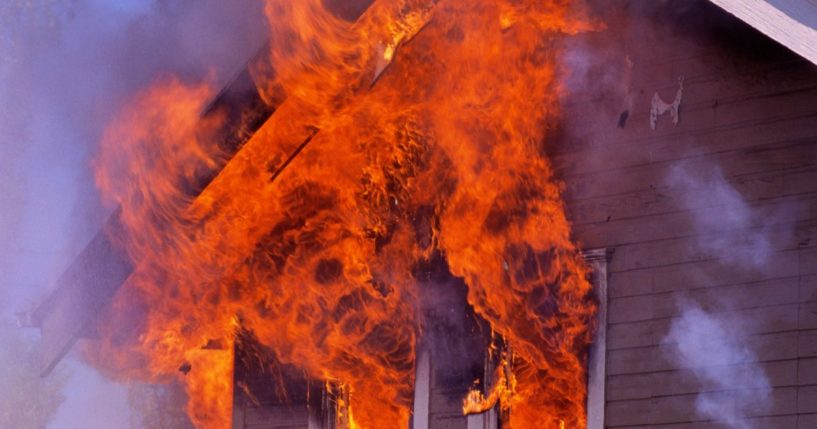 A wooden house burns in Anacortes, Washington.