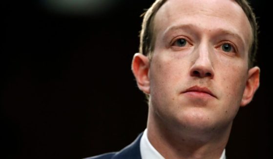 Mark Zuckerberg, seen in a 2018 file photo, told investors he wants to stay the course despite large losses on its new virtual reality products.