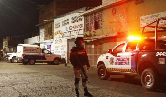 Members of the National Guard stand by the bar where 12 people were killed by an armed group which opened fire on customers and staff, in Irapuato, state of Guanajuato, Mexico, on Saturday.