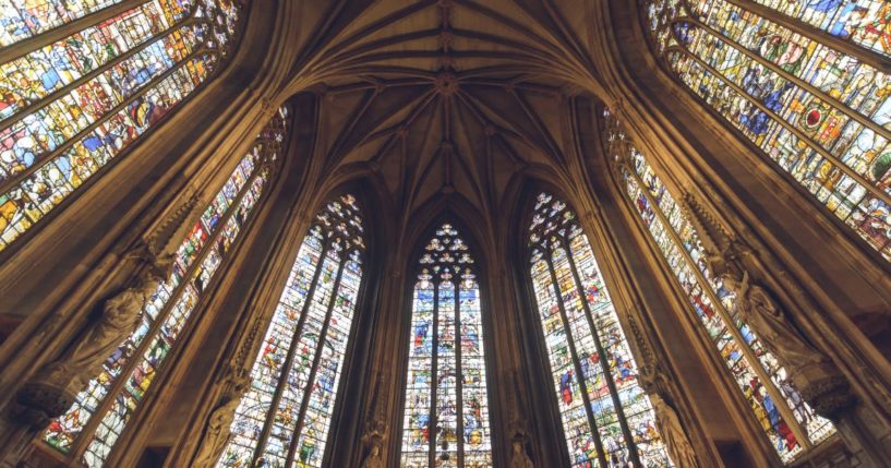 The inside of a cathedral is seen in the above stock image.