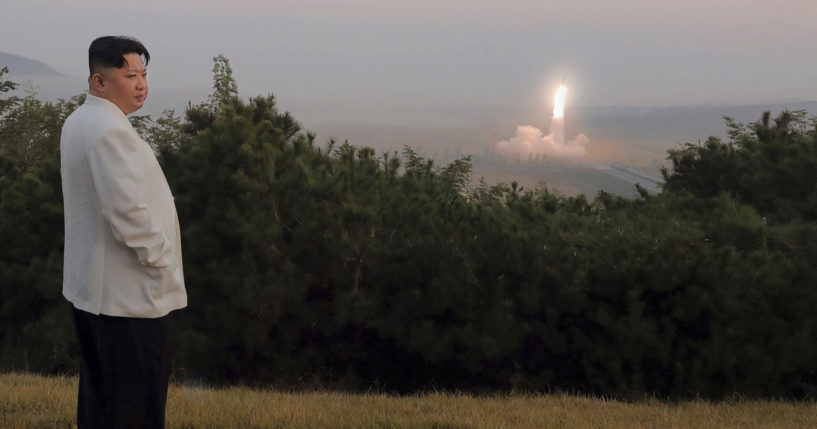 North Korean dictator Kim Jong Un watches a missile test in a photo released Monday.