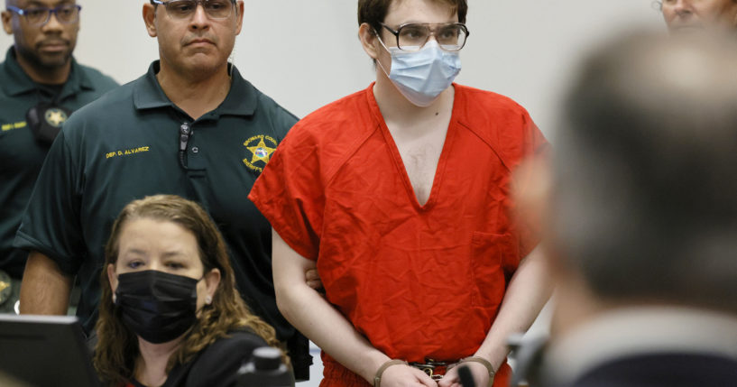 Marjory Stoneman Douglas High School shooter Nikolas Cruz is escorted into the courtroom for a hearing regarding possible jury misconduct during deliberations in the penalty phase of his trial on Oct. 14.